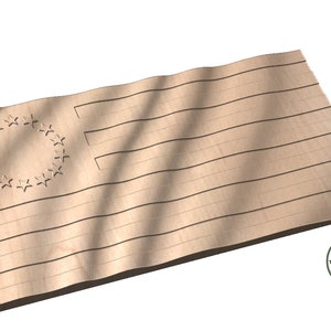 May include: A wooden cutout of the American flag with 13 stripes and a circle of stars. The flag is slightly curved, giving it a wavy appearance.