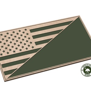 May include: A wooden sign with a diagonal split design. The top half features a laser-cut American flag with red, white, and blue stars and stripes. The bottom half is solid green. The sign has a brown border and the text "AMERICAN SOUTH DESIGNS" is printed in a circle on the bottom right corner.