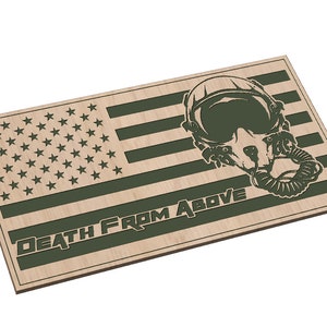 May include: A wooden sign with an American flag design and a pilot's helmet with a gas mask. The text "DEATH FROM ABOVE" is printed below the flag.