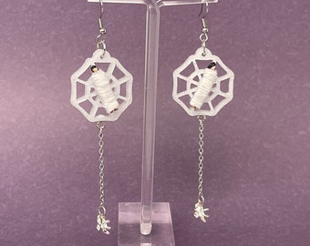 Boucles d'oreilles douillettes