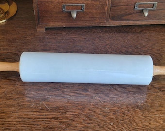 Vintage wood and marble rolling pin.