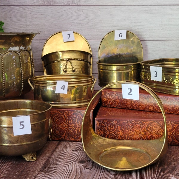 Vintage variety of brass planters. Table and hanging styles.