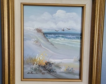 Vintage hand-painted seascape features grasses and seagulls