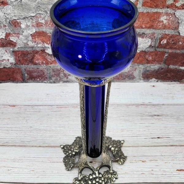 Vintage Challis spelter holder. Cobalt blue glass/vase with ornate silver colored base.