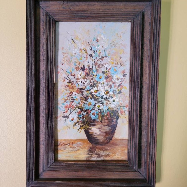 Small painting of blue and white flowers. Wood frame.  Hand painted.