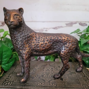 Vintage bronze leopard figurine.