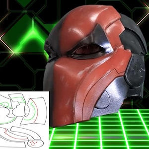 Peut inclure: Un casque en plastique rouge et noir avec un design détaillé. Le casque a une visière et une mentonnière. Le casque est un accessoire pour le cosplay ou Halloween.