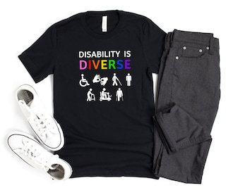 May include: Black t-shirt with the text "Disability is Diverse" in rainbow colors. The shirt features various disability symbols, including a wheelchair, a sign language hand, a cane, and a walker.
