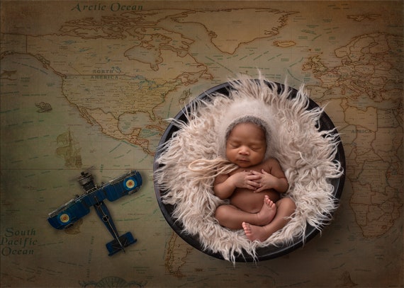 newborn in basket