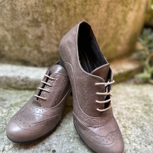 Historical leather shoes, late 1800s, early 1900s. Carnival shoes, Halloween shoes