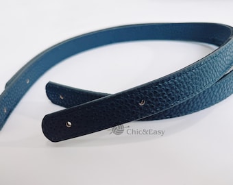 May include: A dark teal leather strap with a textured surface and visible stitching along the edges. The strap features small, evenly spaced circular holes for adjustment and is marked with the text Chic&Easy in the lower center.