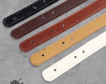 May include: Close-up of five leather straps in black, brown, reddish-brown, tan, and white. Each strap has several evenly spaced holes and a rounded end. The logo "Chic&Easy" is in the lower left corner.