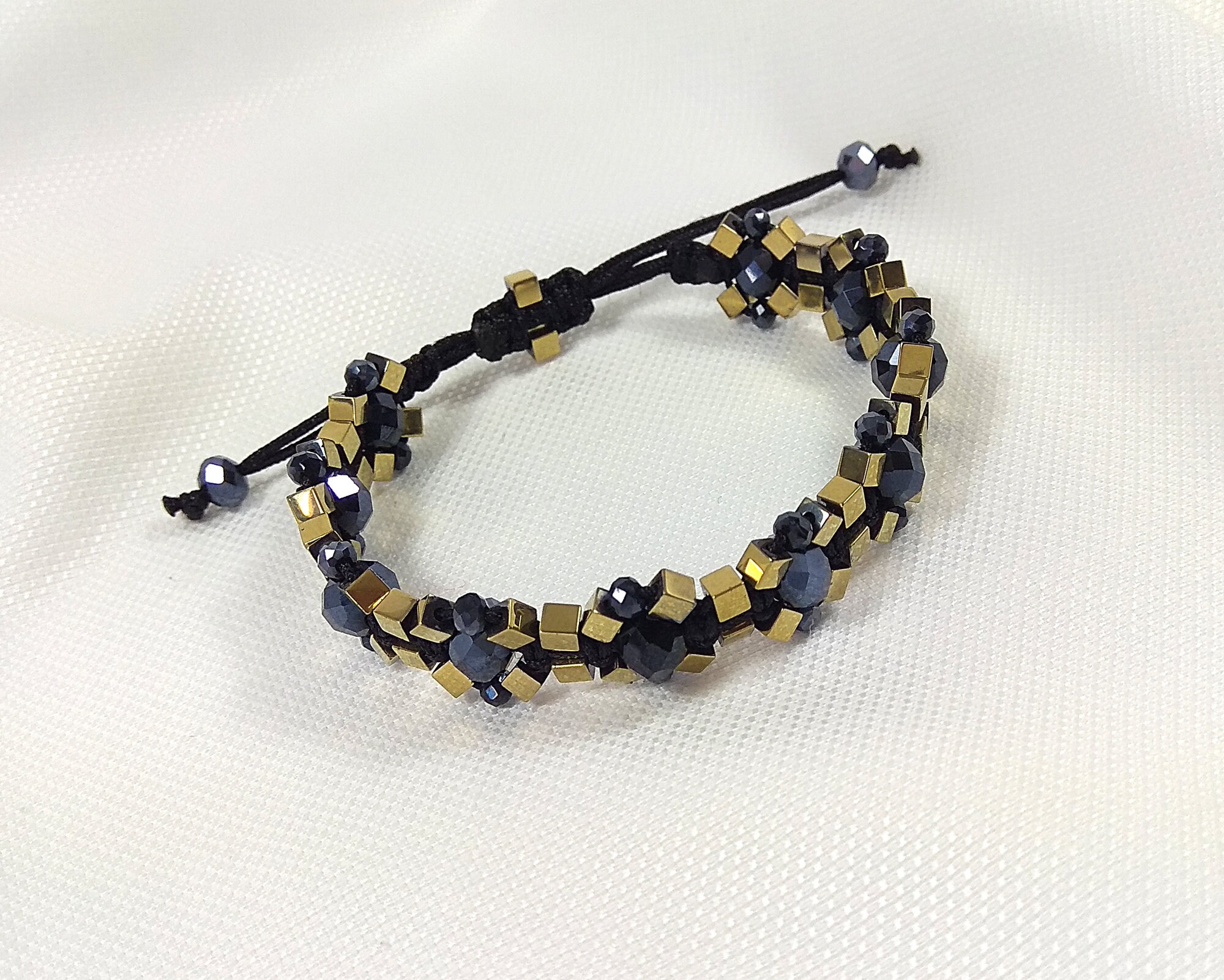 ブレスレット bracciale elegante oro e nero con cristalli e perla Bracciale nero e oro, Bracciale con cristalli scintillanti