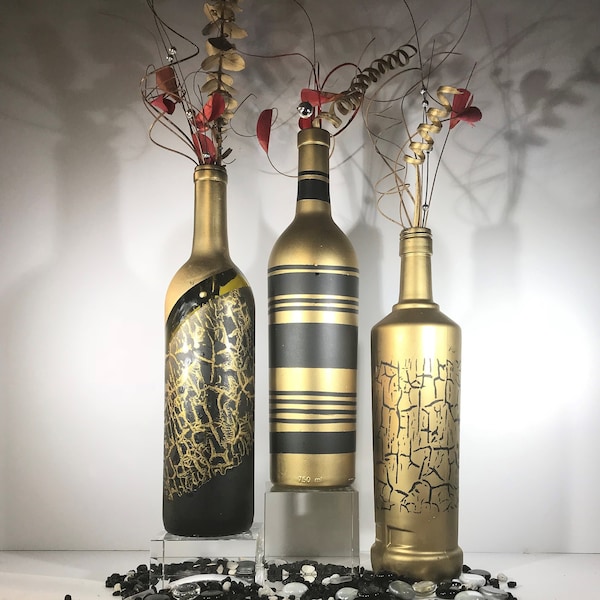 GOLD AND BLACK hand painted bottles are classy, one of a kind and perfect for any occasion.