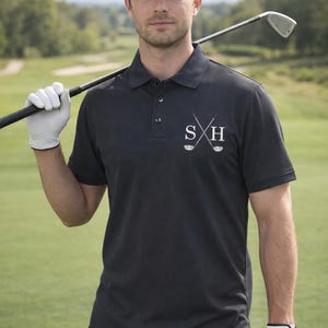 Our personalised golf polo shirt. Model is wearing a size large with the customised initials SH.