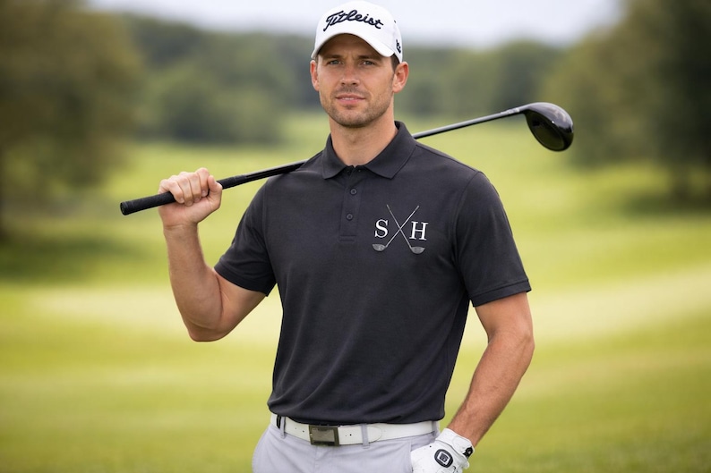 Golfer wearing our personalised polo shirt in Black.