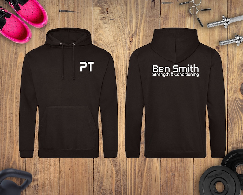 May include: A black hooded sweatshirt with white text. The front of the sweatshirt says "PT" and the back says "Ben Smith Strength & Conditioning".