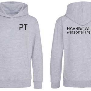 May include: Grey hooded sweatshirt with the text "PT" on the front and "HARRIET MILES Personal Trainer" on the back.