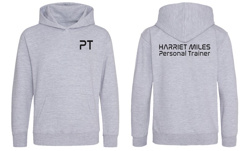 May include: Grey hooded sweatshirt with the text "PT" on the front and "HARRIET MILES Personal Trainer" on the back.