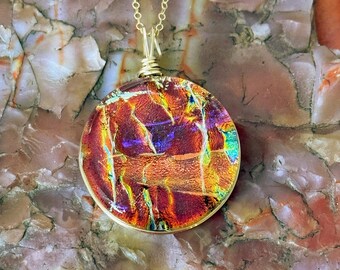 Sedona ~ Large Dichroic Glass Circle Pendant In Warm Reds with Rainbow Flashes