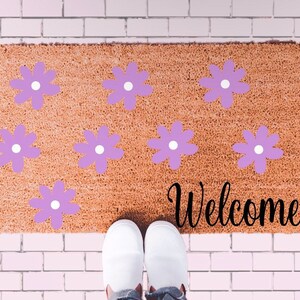 Welcome with purple flowers