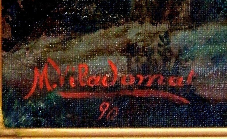 May include: A red signature on a dark blue canvas reads "M. Villadona" with the number "9/2" below it.