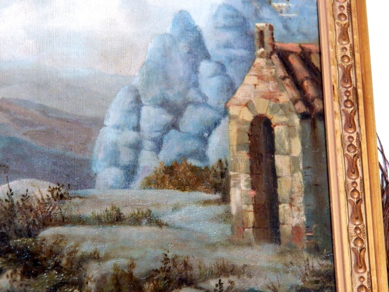 May include: A painting of a stone building with a rounded archway, set against a backdrop of blue-grey mountains and a cloudy sky.