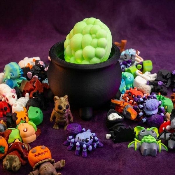 10 Mystery Halloween Pets | 1 Glow-in-the-Dark Bubbling Cauldron Container | Limited Edition Spooky Mix
