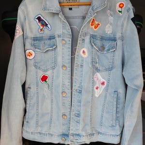 Hand embroidered upcycled denim jacket with patchwork details | Unisex artwear | One of a kind sustainable statement piece