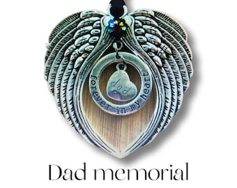 May include: Silver heart-shaped pendant with angel wings and a smaller heart charm that says "dad forever in my heart".