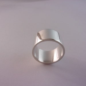Wide flat solid silver ring