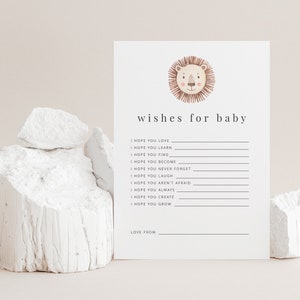 May include: A printable card with a lion illustration and the text "wishes for baby". The card has a list of wishes for a baby, such as "I hope you love", "I hope you learn", "I hope you find", "I hope you become", "I hope you never forget", "I hope you laugh", "I hope you aren't afraid", "I hope you always", "I hope you create", and "I hope you grow".