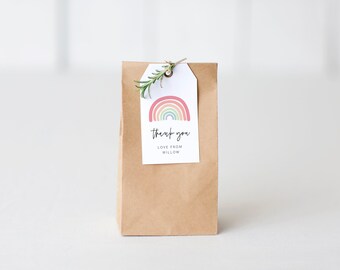 May include: A white thank you tag with a rainbow illustration and the text "thank you, love from Willow". The tag is attached to a brown paper bag.