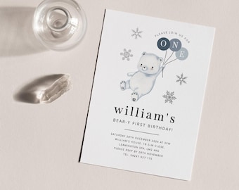May include: A white invitation with blue accents for a first birthday party. The invitation features a cartoon polar bear holding blue balloons with the letters "O" and "N" and "E". The text reads "Please join us for William's Bear-y First Birthday!" and includes the date, time, and location of the party.