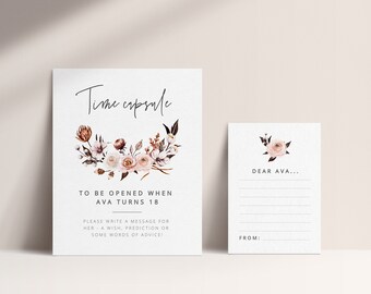 May include: A white card with a floral design and the text "Time capsule" and "To be opened when Ava turns 18".  The card also includes instructions to write a message for Ava, a wish, prediction, or some words of advice. A smaller white card with a floral design and the text "Dear Ava..." and "From:" is also included.