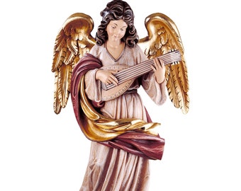 May include: A wooden angel figurine with gold wings playing a lute. The angel is wearing a flowing robe with gold and red accents.