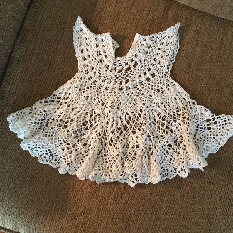 Baby dress in intricate lace