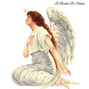 May include: A white-winged angel with long brown hair, wearing a white gown, sits with her head tilted back and her hands clasped in front of her. The angel is depicted in a vintage style.