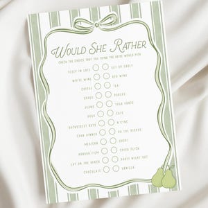 Peut inclure: Une carte de jeu "Would She Rather" à rayures vertes et blanches. La carte présente une bordure décorative et un nœud en haut. Le texte comprend des options telles que "Dormir tard" et "Se lever tôt".