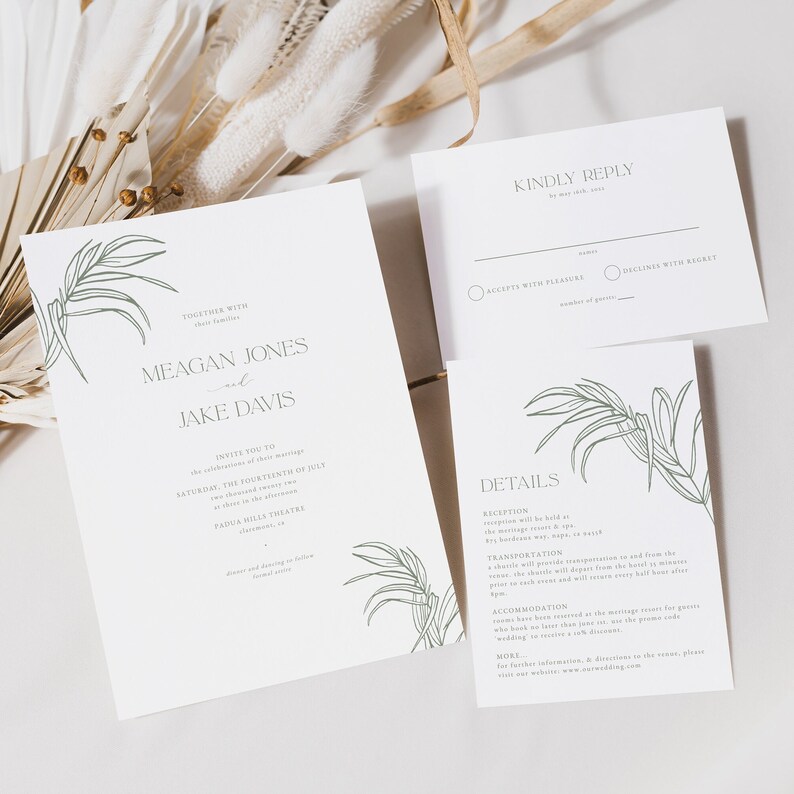 May include: Wedding invitation suite with a minimalist design. The invitation features the names "Meagan Jones and Jake Davis" and event details. Includes a reply card and details card, all with a green botanical illustration.