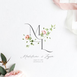 May include: A wedding invitation with a floral monogram of the letters "M" and "L" in gray script. The letters are intertwined with pink flowers and green leaves. The text "Madeleine & Loyer" is written in cursive below the monogram, followed by the date "August 19, 2023" and the location "LOUISVILLE, KY".