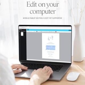 May include: A laptop computer displaying a wedding invitation template on a screen. The invitation is a light blue color with a floral design and the text "Melisse And Josh Peters". The text "Edit & Move Text - Font Type - Size - Color - Line & Text Spacing - Background - Add Images - And More." is displayed below the laptop.