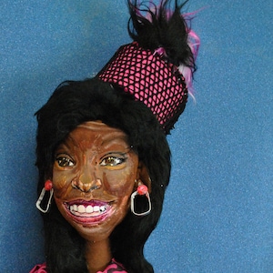 Whoopi Goldberg, personalized doll that represents her, in her interpretation of Oda Mae from the movie Ghost. The doll measures 40 cm
