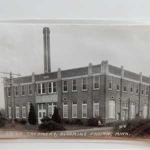Bloeiende Prairie, Minnesota. RPPC-Co-op Creamery. 1909
