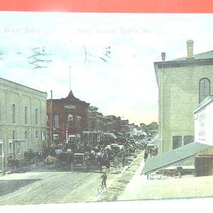 Sparta, Wisconsin. Rua Principal durante a temporada de frutas vermelhas. 1910