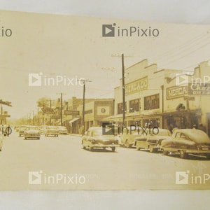 Nogales. Fils. Mexique. Obregon Ave. RPPC Années 1920 Très bon état - Détails clairs. Choza's, Mercado, Liqueurs, Mexique Lindo, Selles, Marché.
