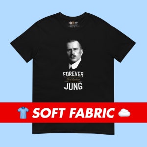 May include: Black t-shirt with a black and white image of Carl Gustav Jung. The text "FOREVER Carl Gustav JUNG" is printed in gold on the shirt.