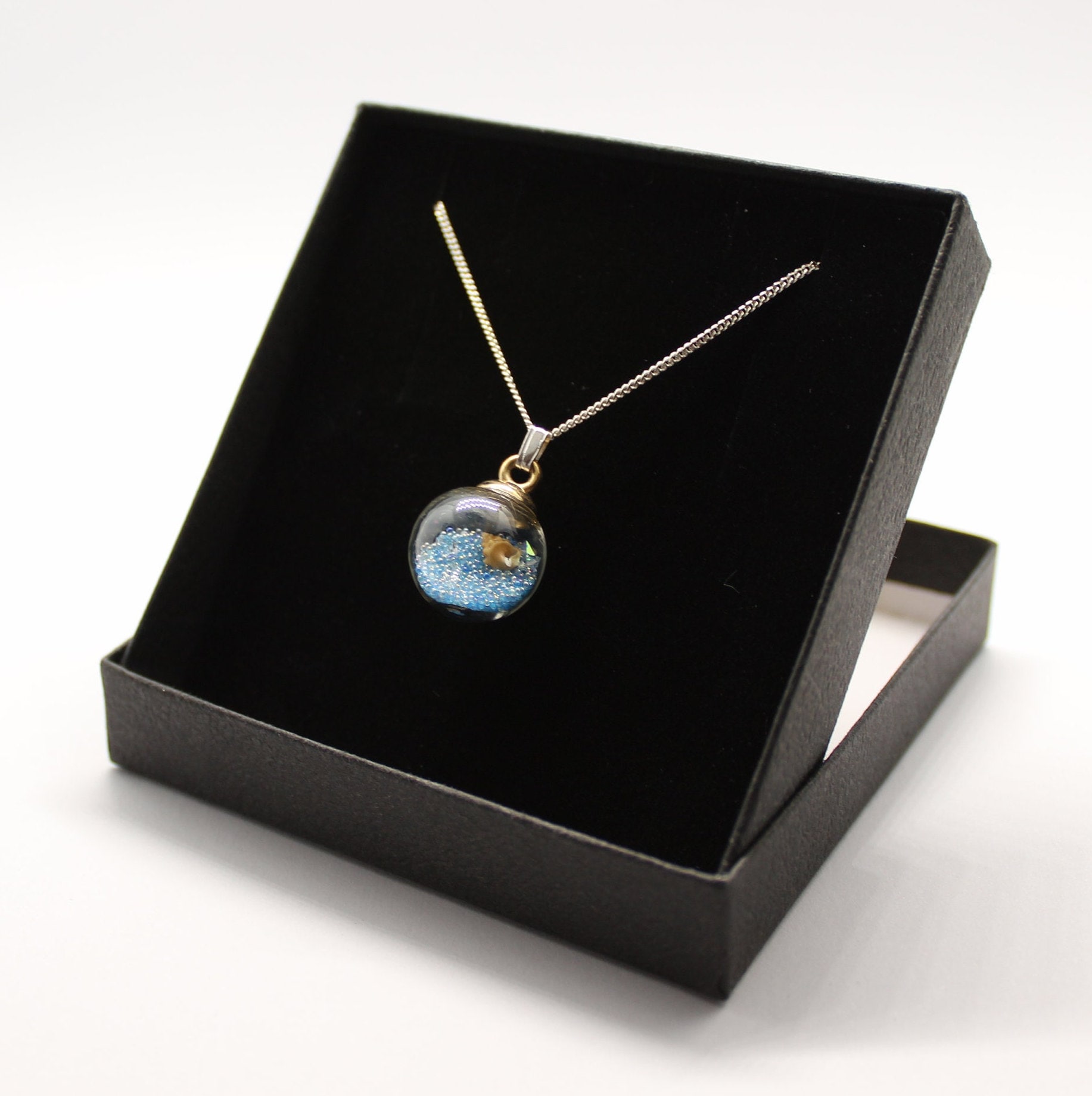 34 Discover Unique Map-Themed Jewelry for Your Next Adventure 9 Blue Wishing Globe Necklace - Sterling Silver Chain, Crystal & Shell