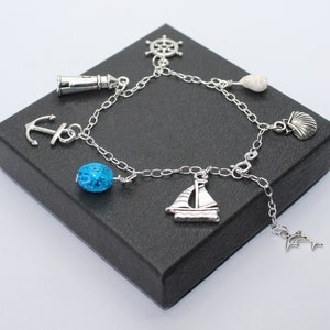 Nautical / seaside tropical lighthouse shell boat dolphin anchor helm - Sterling Silver Cable Link charm bracelet with Glass Crackle Bead