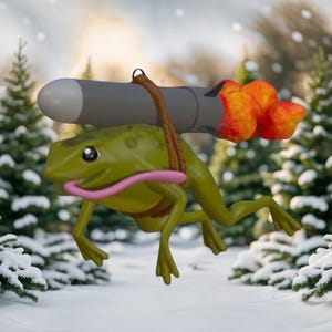 May include: A green frog with a pink tongue is flying through the air with a grey rocket strapped to its back. The rocket is on fire and the frog is looking forward.